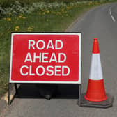 Road Closed signs