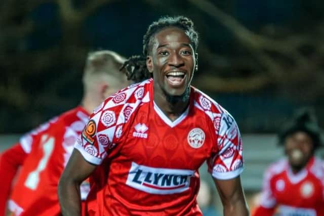 Samuel Adenola celebrates his debut goal on Saturday. Photo: Jemma Sear/HHTFC.