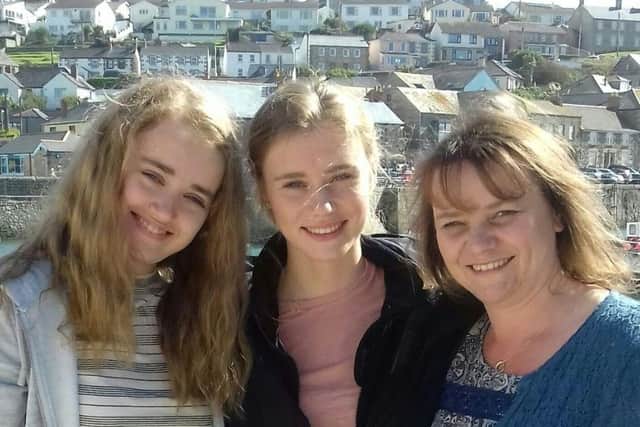 Ali Adams with her daughters.