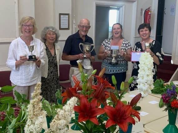Trophy winners from left to right Gillian Johansson, Jane Cayley, Mike Leon, Debbie Oastler and Claire Winter