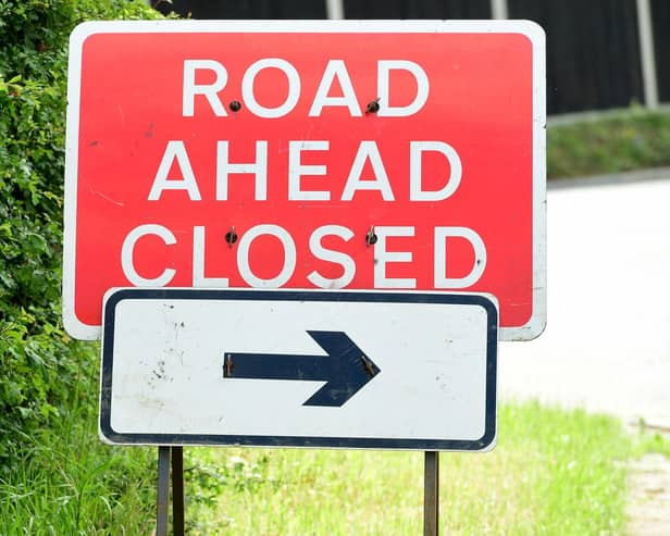General view of a road ahead closed sign