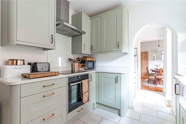The kitchen is brimming with rustic charm while including the necessary modern appliances.
