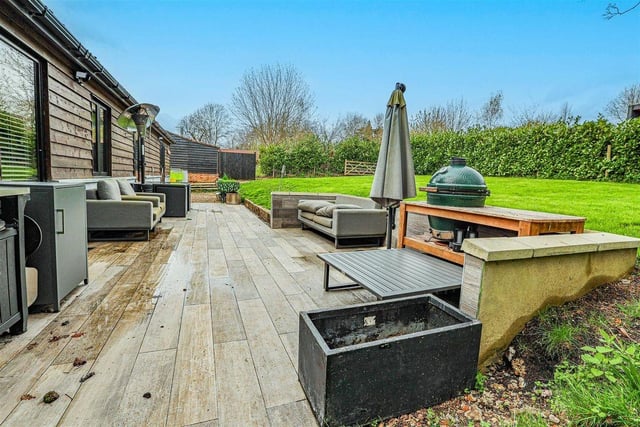 Come summer, the decking area is perfect for relaxing outdoors and a spot of al fresco dining.
