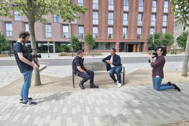 PC Marcus Zost is interviewed by former police officer turned TV presenter Rav Wilding