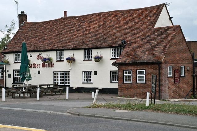 The Leather Bottle pub looks out on to the village green. Credit: Q Barrett