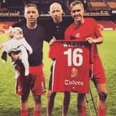 Spencer with Darren, right, and his other brother Jack, left