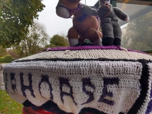 Paying homage to the fallen horses of the World Wars, this topper shows a horse and a soldier