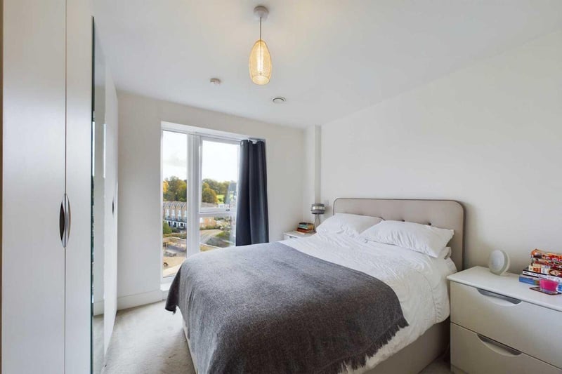 The master bedroom benefits from peaceful garden views and lots of daylight.
