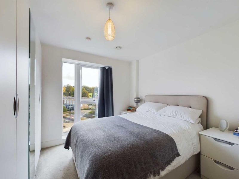 The master bedroom benefits from peaceful garden views and lots of daylight.