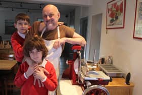 Claude pictured with his sons, Oszkar and Anton