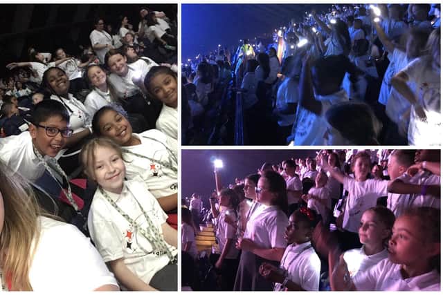 Schoolchildren at thee concert on Tuesday in Wembley Stadium.