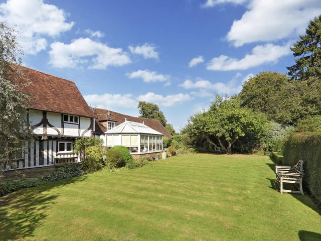 The delightful gardens and grounds extend to around 0.5 acre with gated access from the The Street. The front features raised floral beds and kitchen garden