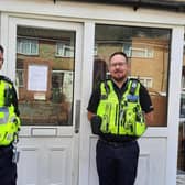 Police officers at the address. Photo: Herts Police