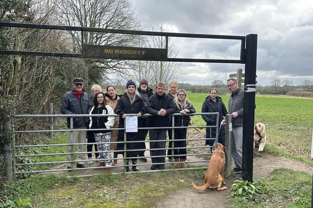 Nicola Catlin (centre) pictured with residents at he entrance to Bunkers Park