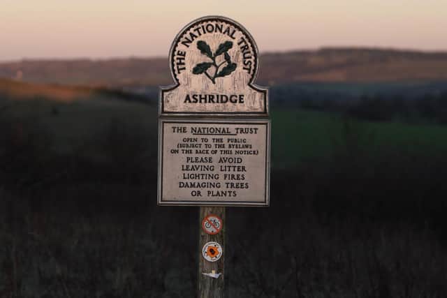 A National Trust marker bearing the title \"Ashridge\" at Ivinghoe Beacon in the Chiltern Hills, Buckinghamshire. Credit: Will Durrant/LDRS