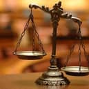 Scales of justice. Photo: Herts Police