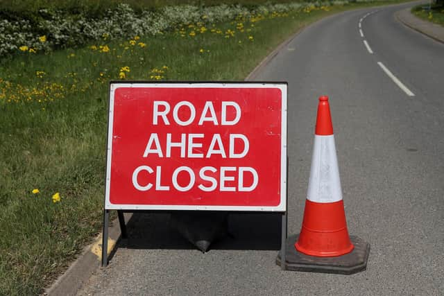 Road closed sign