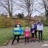 Local parents raise awareness on MPs voting record in regards to the climate and environment. 
