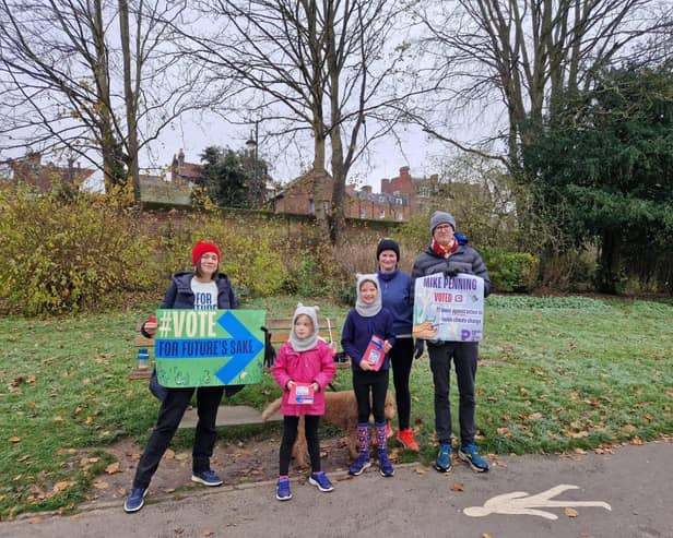 Local parents raise awareness on MPs voting record in regards to the climate and environment. 