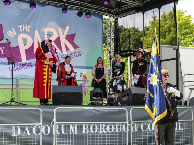 Hemel Hempstead's town crier on stage at The Platinum Party in the Park.