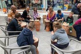 Shoppers and charity members gathered to enjoy a drumming session at the Marlowes. Image: Yvonne Davis