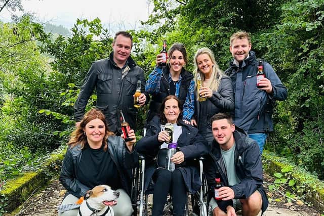 Sue and her family on their trip to Devon