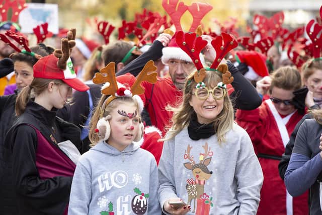 Runners with their antlers at the run last year