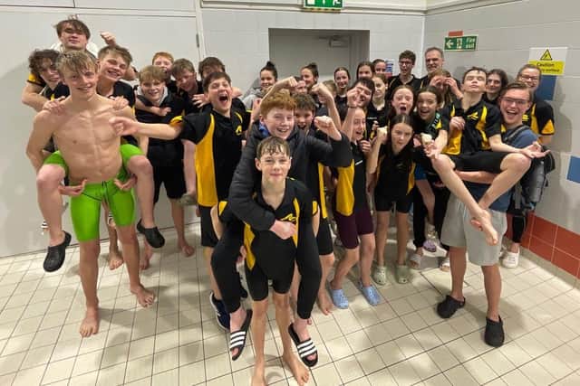 Tring swimming club celebrating Arena league success