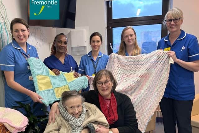 CLM- Margaret, Lynette and the midwifery team on Rothschild ward with the baby hats and blankets donated