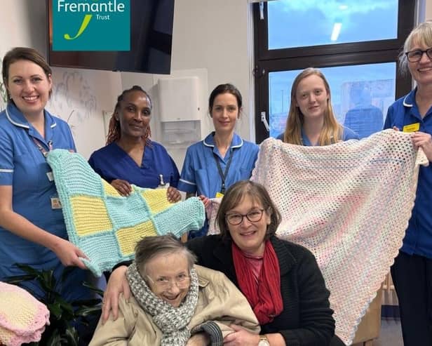 CLM-  Margaret, Lynette and the midwifery team on Rothschild ward with the baby hats and blankets donated