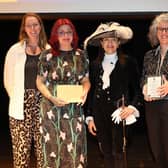 Charlotte Fletcher, Bec Down and Rebecca Kelly receiving the award from Hertfordshire's High Sheriff, Annie Brewster