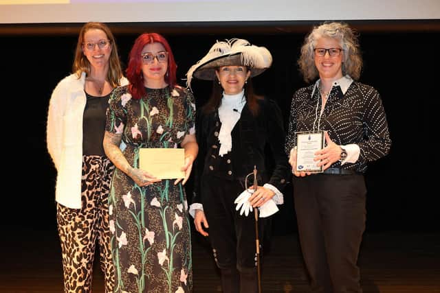 Charlotte Fletcher, Bec Down and Rebecca Kelly receiving the award from Hertfordshire's High Sheriff, Annie Brewster
