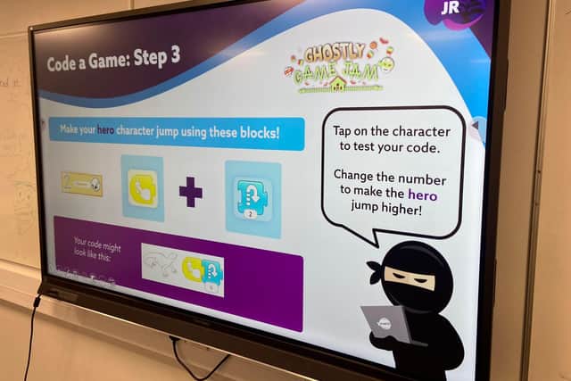 Attendees followed instructions to create their own game in Scratch JR