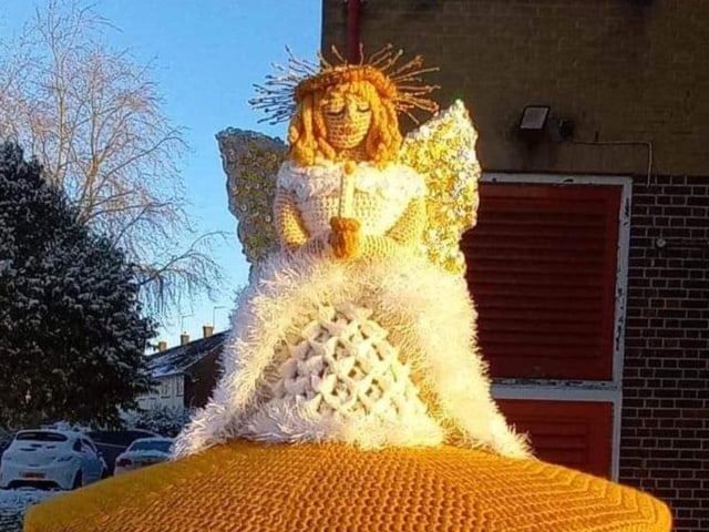 The angel sits outside of the Bellgate shops