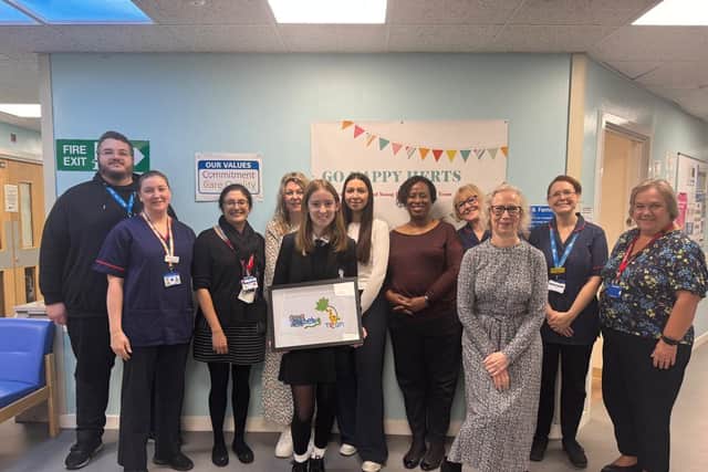 Savannah with members of the paediatric diabetes service team at Hemel Hospital