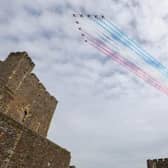 The Red Arrows fly over Carrickfergus Castle in 2021. Picture by Matt Mackey / Press Eye.