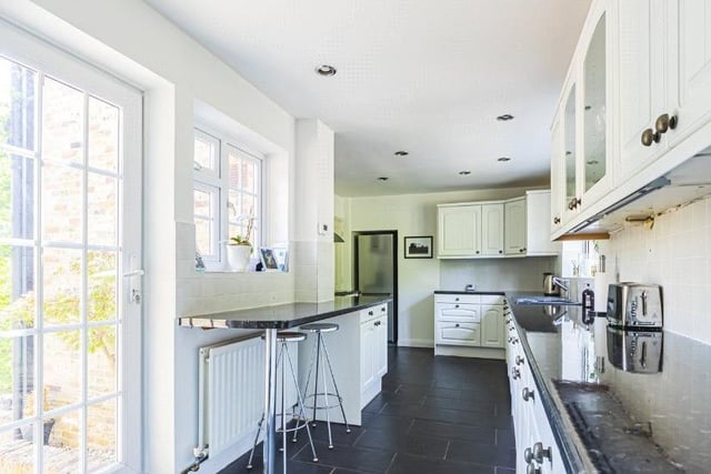 The stylishly modern kitchen is fitted with top of the range integrated units and offers plenty of storage and cupboards – with even more on offer in the separate utility room, says Castles.