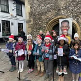 Members of Redbourn Primary School Choir sing at The Clock Tower in St Albans