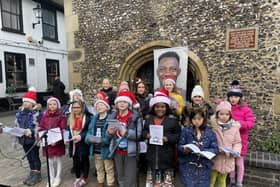 Members of Redbourn Primary School Choir sing at The Clock Tower in St Albans