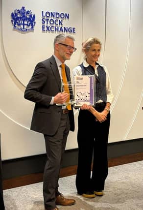 Darren Roe receives the Winner of Winners Award from Martha Lane Fox