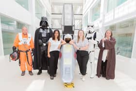 Staff at Breakspear Park alongside Darth Vader, a Stormtrooper, a Jedi knight, and a pilot