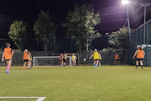 Pictured: Women playing during game on Monday night