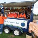 Pictured: Schoolchildren working in the Blue Tangerine horsebox café