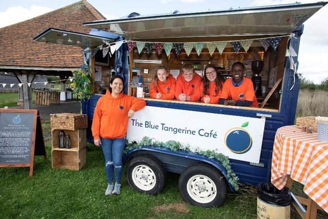 Pictured: Schoolchildren working in the Blue Tangerine horsebox café