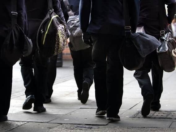 Students find out which secondary school have offered them a place today.