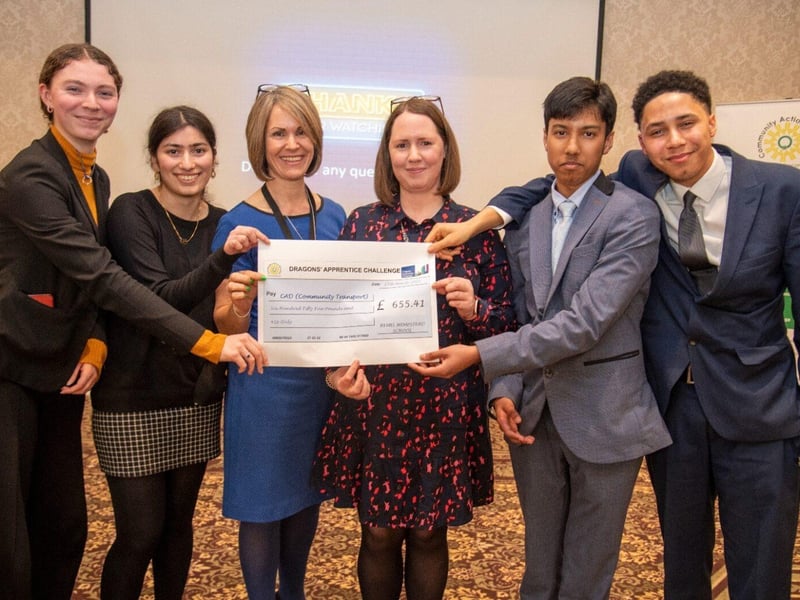 Team Ashlyns with their charity Community Transport and dragon Helen Young from SA Law.