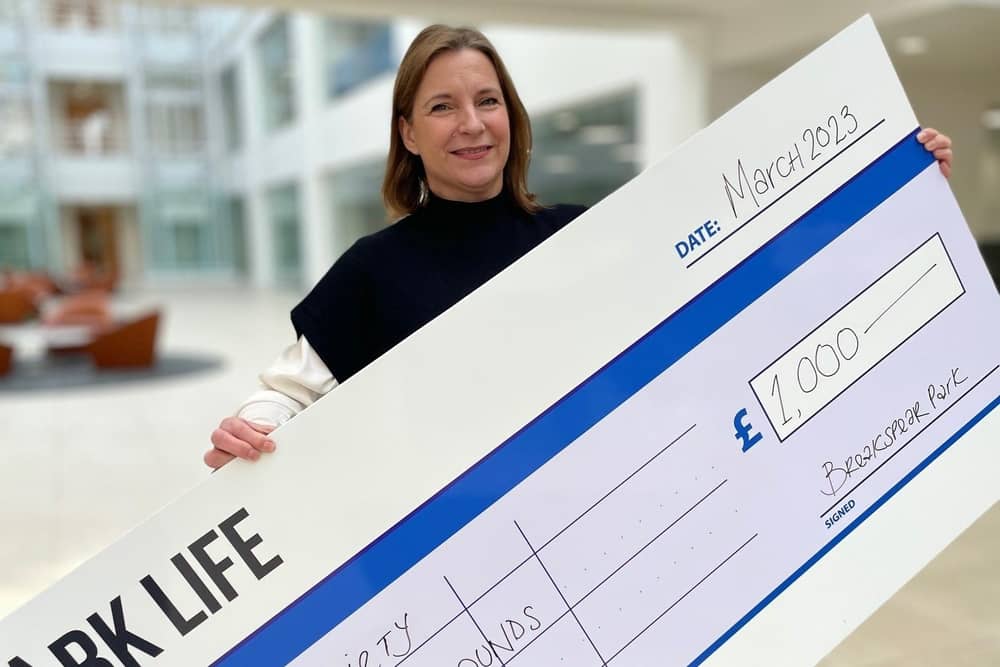 A donation was presented to Susie Norey of the AT Society