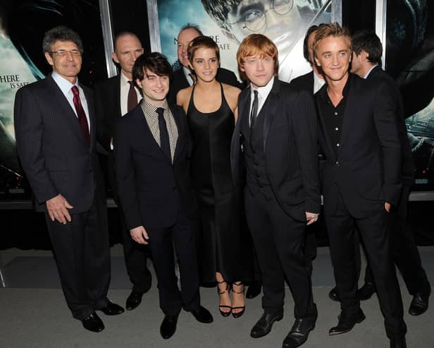 NEW YORK - NOVEMBER 15:  (L-R) Allen Horn, Daniel Radcliffe; Emma Watson, Rupert Grint, Tom Felton and David Heyman attend the premiere of "Harry Potter and the Deathly Hallows - Part 1" at Alice Tully Hall on November 15, 2010 in New York City.  (Photo by Stephen Lovekin/Getty Images)