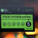 Pictured: Food Standards Agency rating certificate in the window of a restaurant