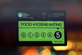 Pictured: Food Standards Agency rating certificate in the window of a restaurant